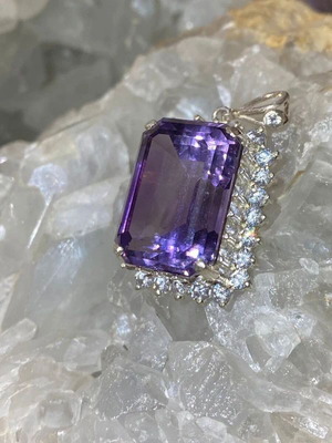 Silver pendant with large cut natural amethyst stone and moissanites