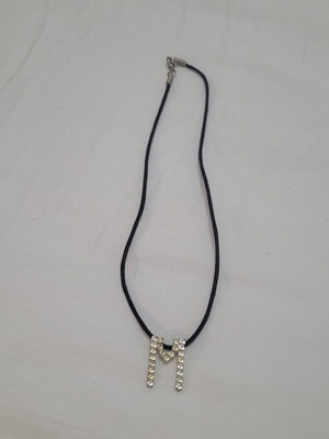Women's necklace with 'M' monogram and rhinestones