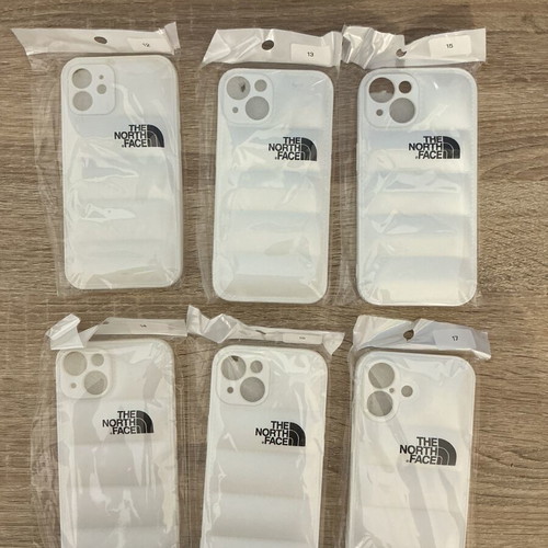 The North Face Puffer iPhone Case new, TPU material