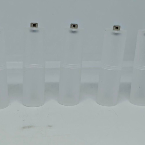 Battery adapters AA to C set of 8, like new, plastic transparent