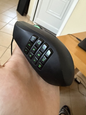 Razer Naga 2014 MMO gaming mouse with 12 thumb buttons, 8200 DPI
