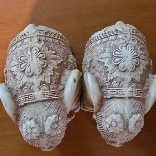 Pair of decorative elephants used with detailed embossed design