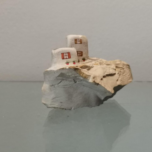 Handmade souvenir used on natural volcanic stone