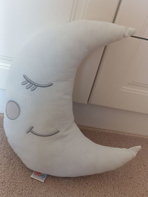 Blue moon-shaped pillow like new