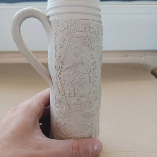 Die Schnelle carved beer mug like new, embossed clay
