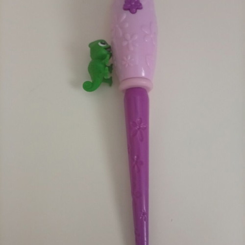 Disney Rapunzel doll with curling wand like new, missing purple dress