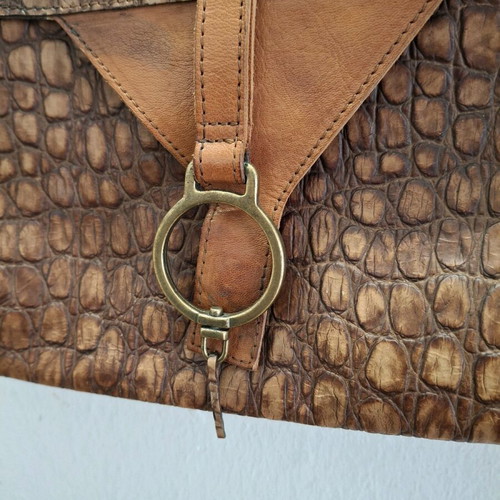Vintage cowboy leather shoulder bag with metal accents like new