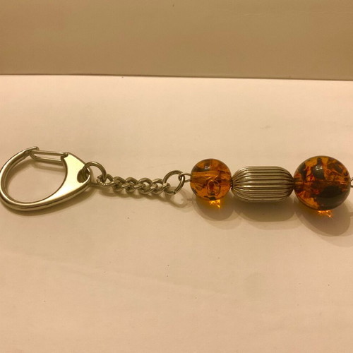 Keychain with metal elements and amber-type beads new, brown and silver