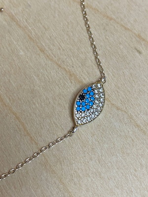 Silver bracelet new with blue evil eye