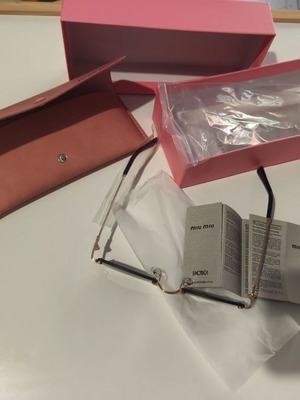 Miu Miu sunglasses women like new, black and gold