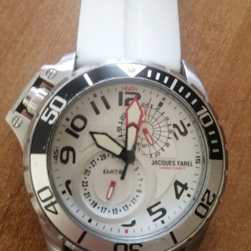 Jacques Farel watch with luminous hands and extra silicone strap
