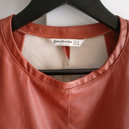Stradivarius leatherette top new, orange, small with shoulder pads