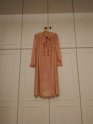 Jersey dress used, apricot color with white polka dots, size M