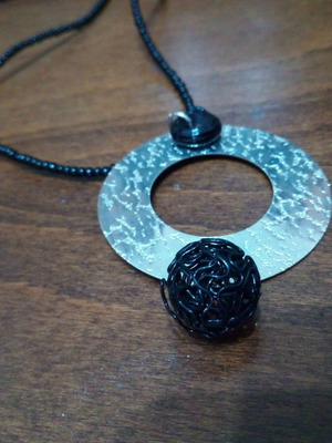 Steel circle pendant used, silver-black with chain