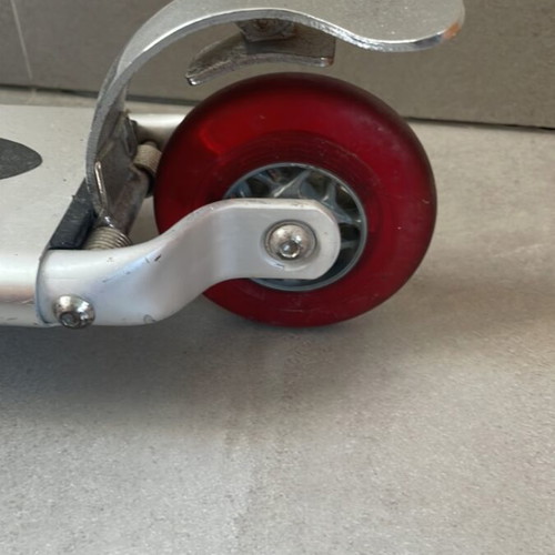 Scooter used with adjustable handlebar height and rear wheel brake