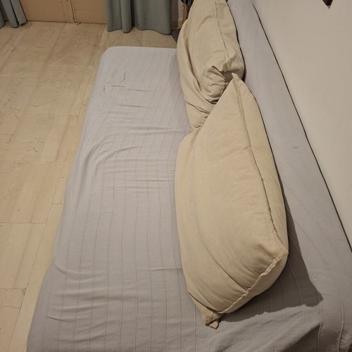 Ikea sofa bed used with storage and 2 cushions