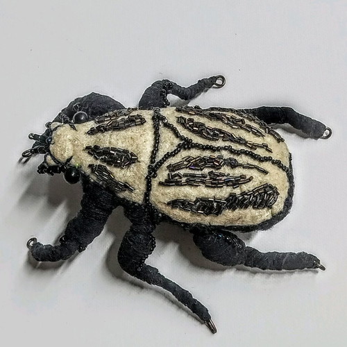 Art object Beetle new fabric with beads