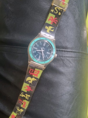 Watch with funky plastic animal strap used