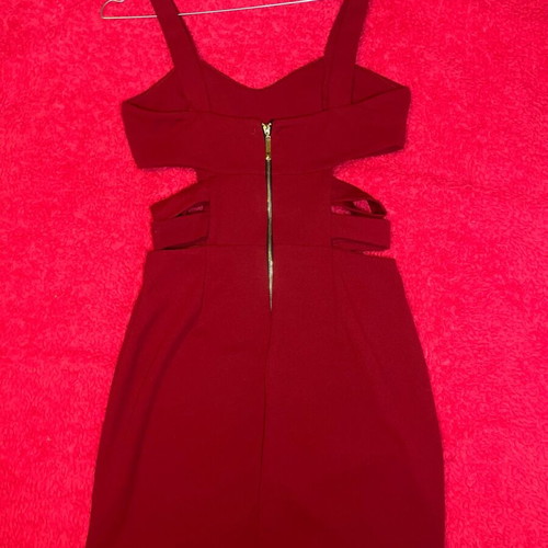 Red mini dress like new, fitted with cutouts and bust support