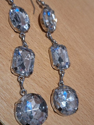 Zircon earrings new, 7.5 cm length, silver color