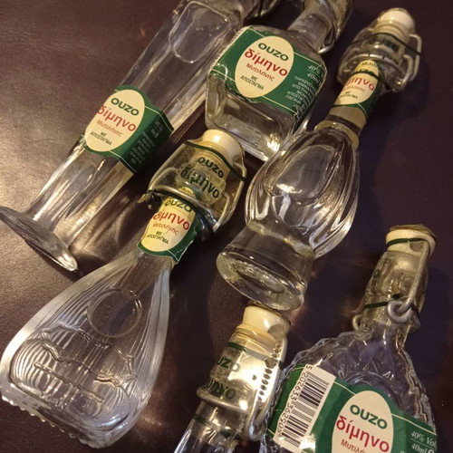 Miniature liquor bottles used, collection of 8 shaped like musical instruments