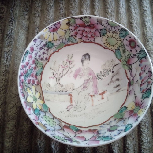 Vintage porcelain bowl used from the Far East