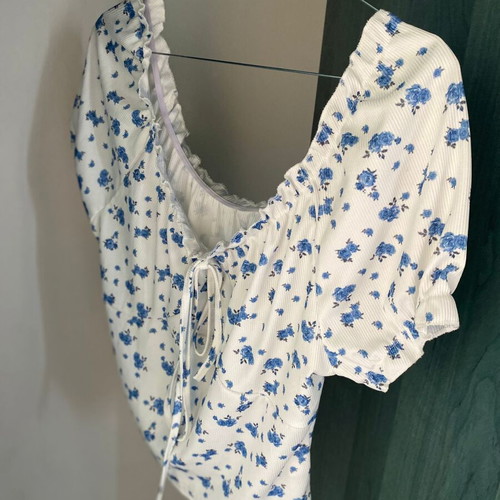 White top with blue flowers like new