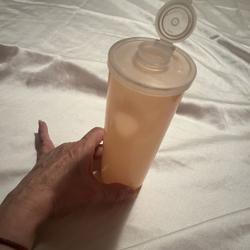 Tupperware shaker new, salmon color with double opening lid