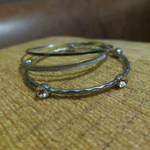 Silver bracelets set of 3 like new with stones and glitter
