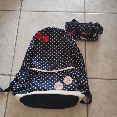 School backpack with pencil case used, polka dot design