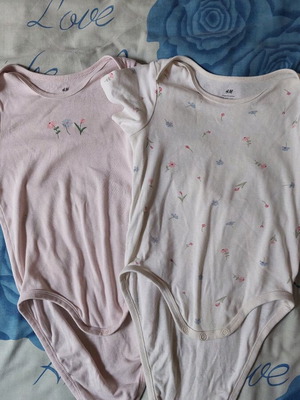 H&M baby bodysuits used, set of 2 with small holes