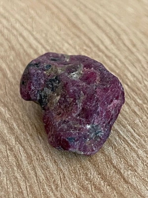 Raw large ruby 109ct in airtight display case