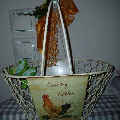 Metal basket new decorated with ribbons, flowers and butterflies