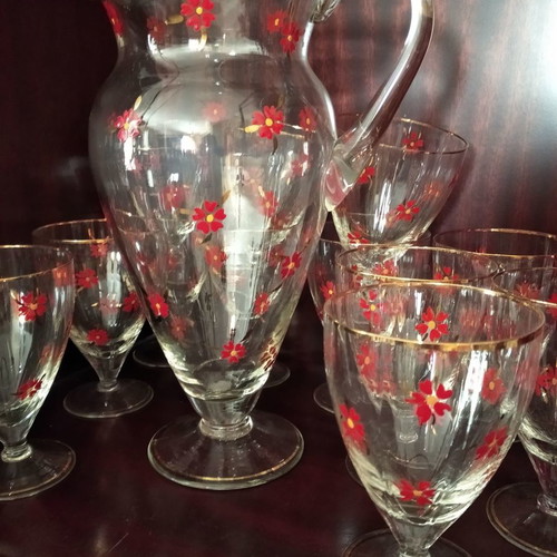 Antique set pitcher with twelve glasses for water or juice used
