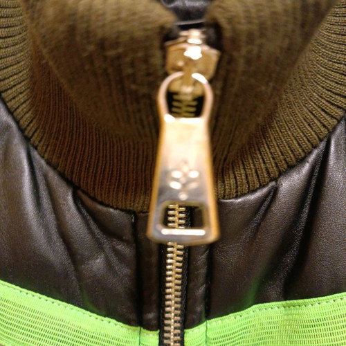 Rossodisera sleeveless jacket used with metallic details