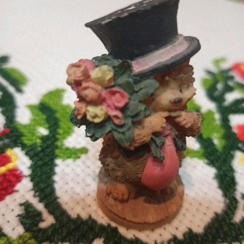Hedgehog miniature figurine used, decorative with hat and flowers