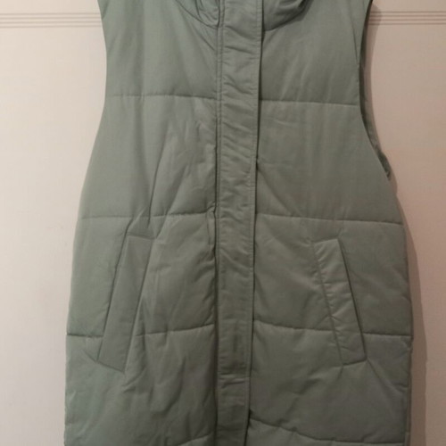Sleeveless jacket mint color size Large like new