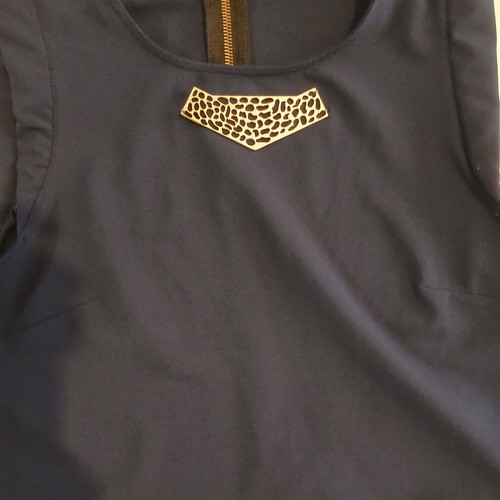 Iso blue blouse with sewn jewelry