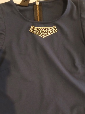 Iso blue blouse with sewn jewelry