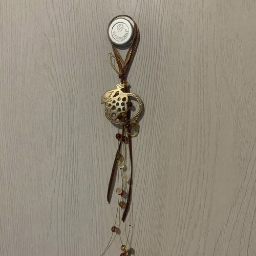 Hanging pomegranate charm new with gold and red ribbon