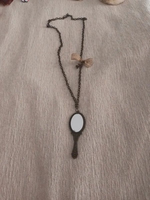 Vintage necklace with hand mirror used, bronze, bow and phone element