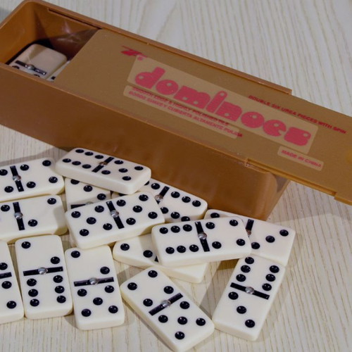 Domino set with 28 ivory-like tiles in wooden box like new
