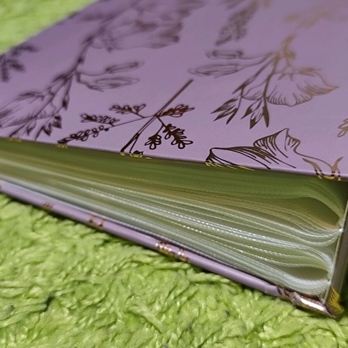 Photo album 10x15 new, holds 200 photos
