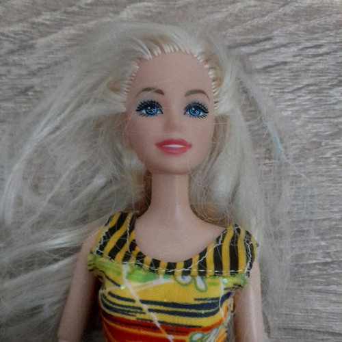Barbie doll used