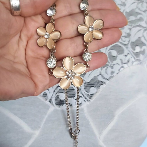 Choker necklaces like new with black ornaments, mother-of-pearl flowers and hearts