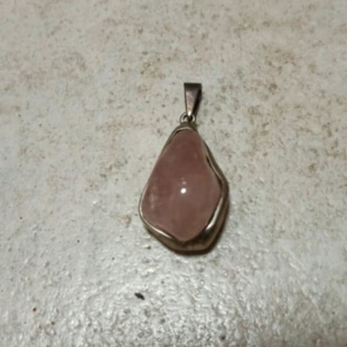 Silver pendant with large pink stone like new