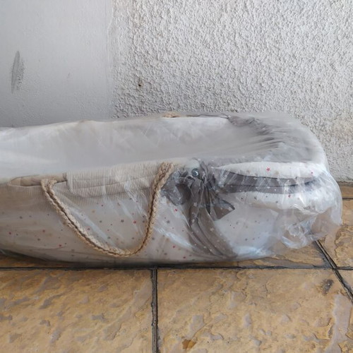 Knitted bassinet like new with mosquito net