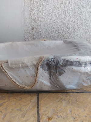 Knitted bassinet like new with mosquito net
