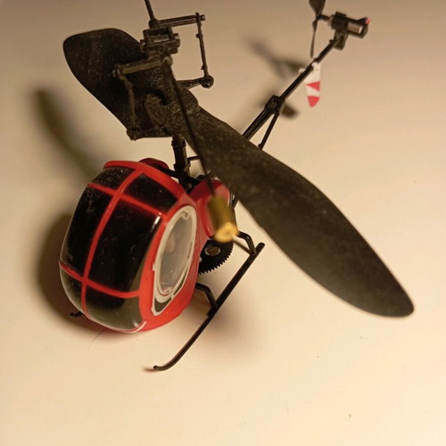 Remote control helicopter used, non-working with controller and 3 extra blades