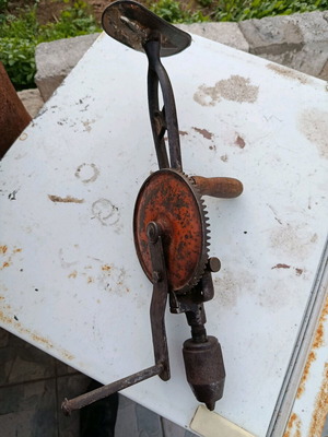 Large hand drill used with minor tip repair needed